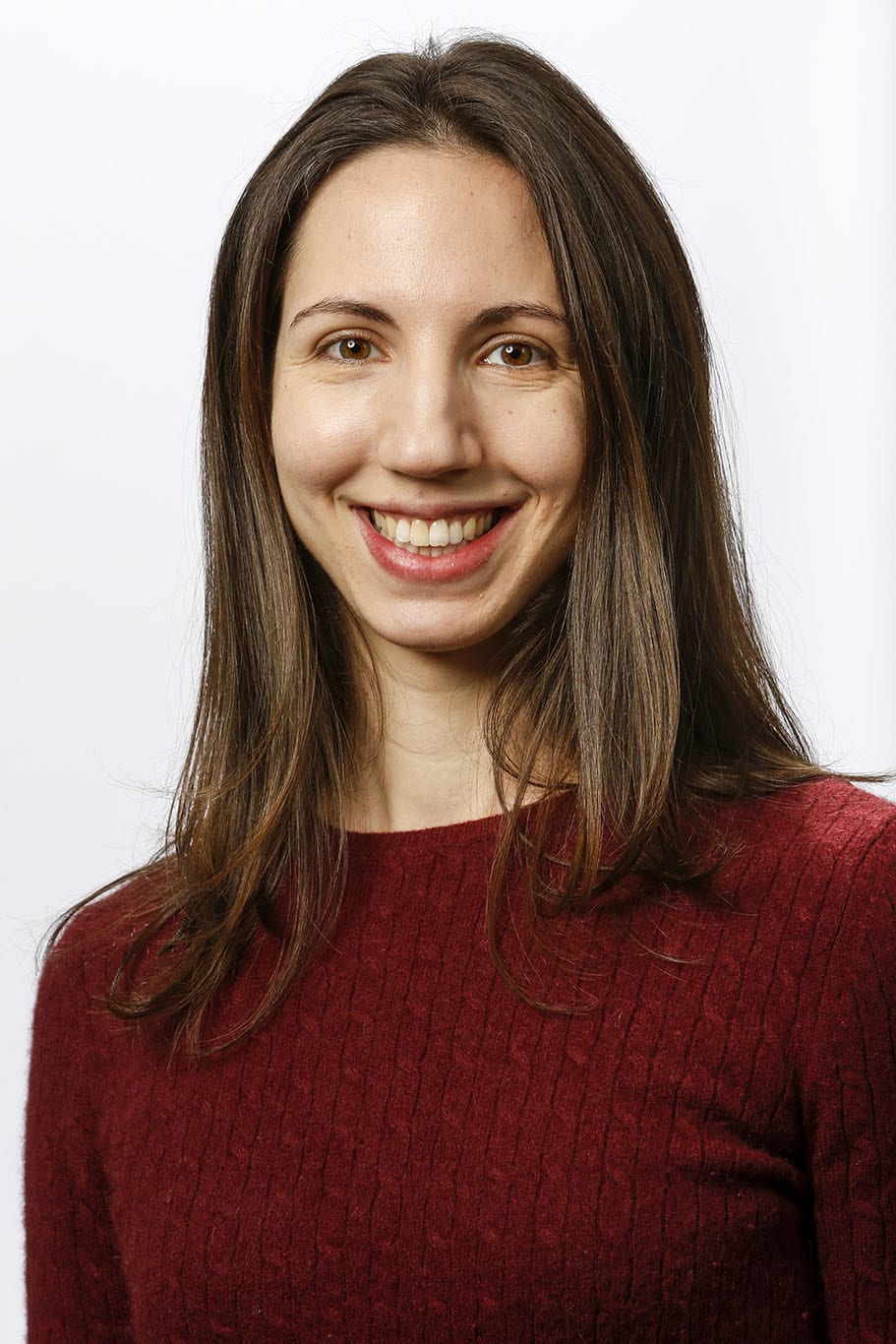 Portrait of Abby Tadenev against a white background.